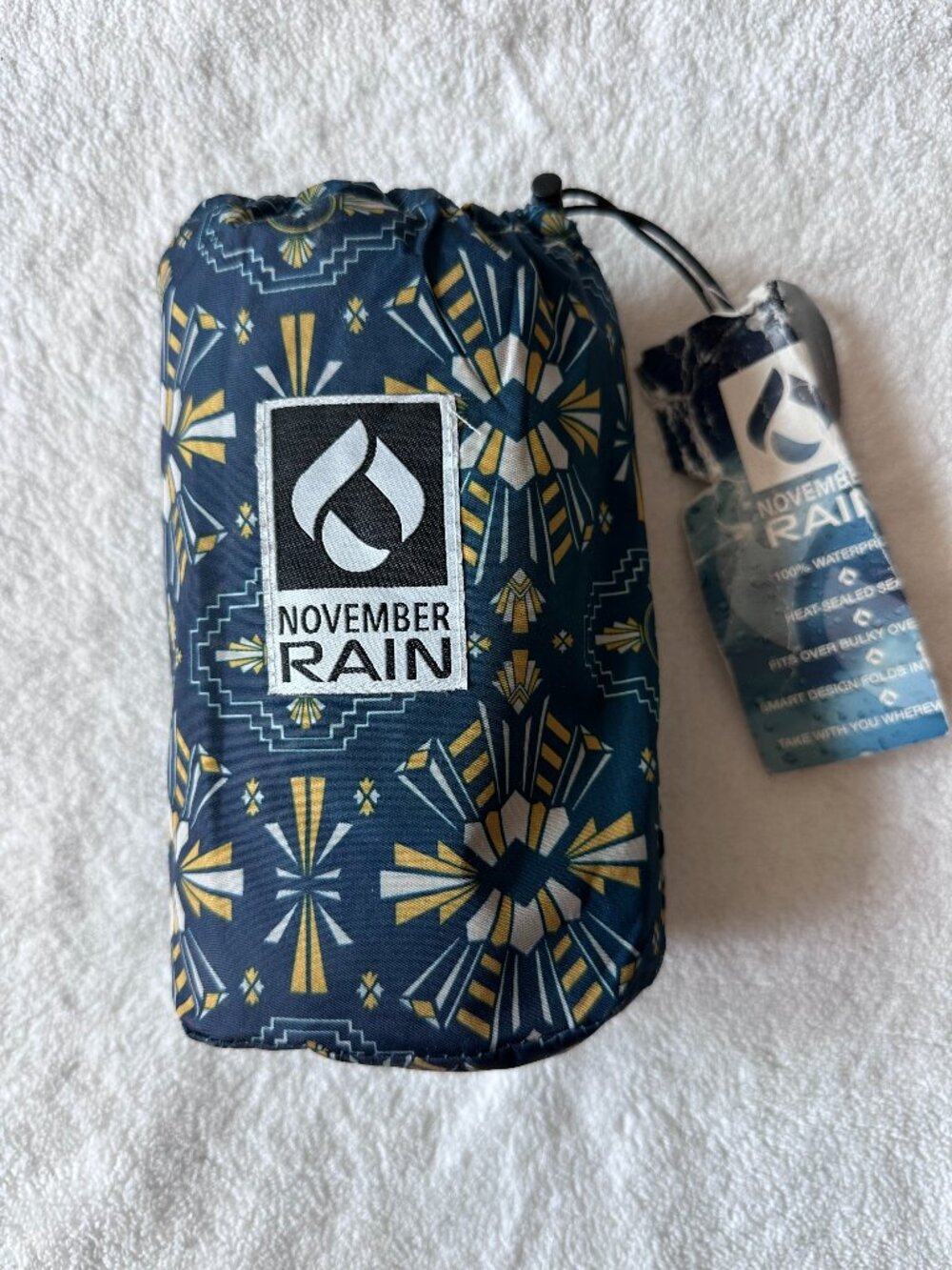 NWT November Rain Waterproof Poncho in Tribe Design with Travel Pouch Included